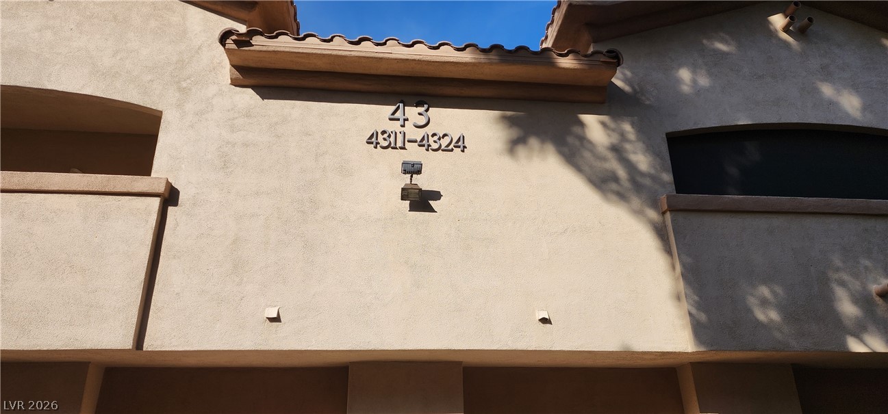 2050 West Warm Springs Road, Unit 4323 Henderson, NV 89014 - Photo 3 of 48 Exterior view of stucco siding