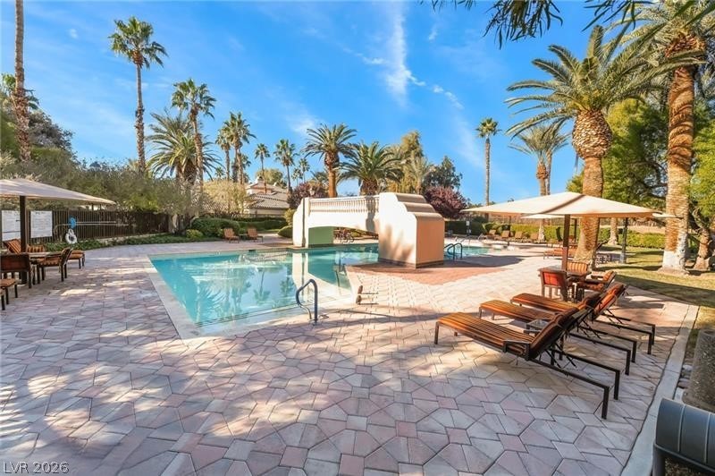2050 West Warm Springs Road, Unit 4323 Henderson, NV 89014 - Photo 40 of 48 Community pool with a patio area