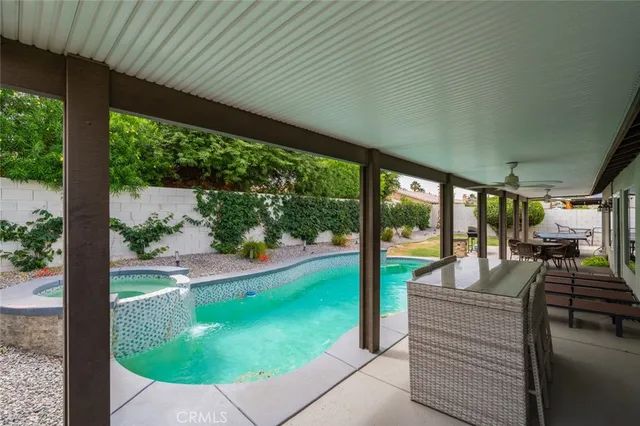 an outdoor view of garden with patio