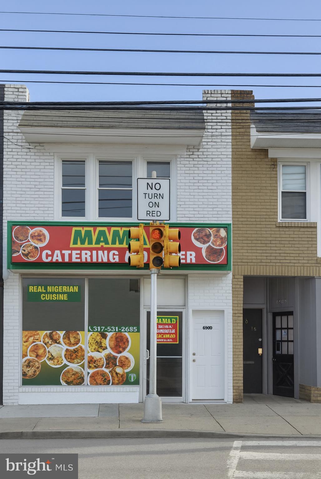 669 Long Lane Upper Darby, PA 19082 - Photo 19 of 19 a sign on the side of a building