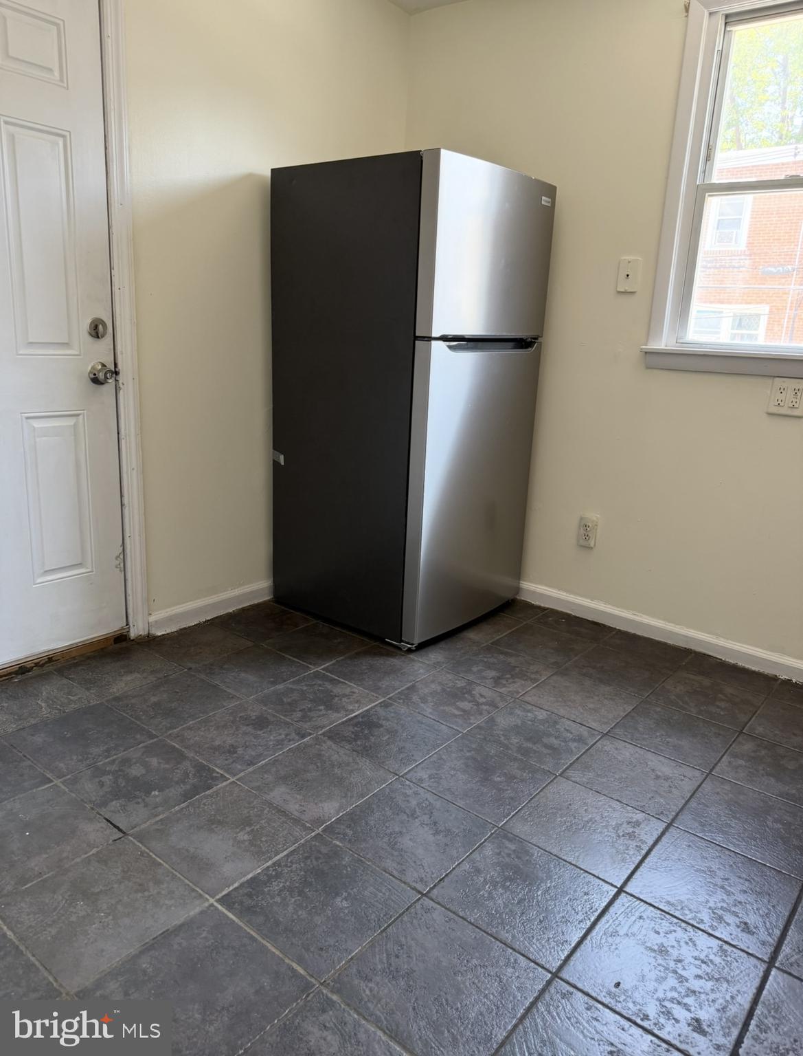 669 Long Lane Upper Darby, PA 19082 - Photo 6 of 19 a view of an empty room with a kitchen