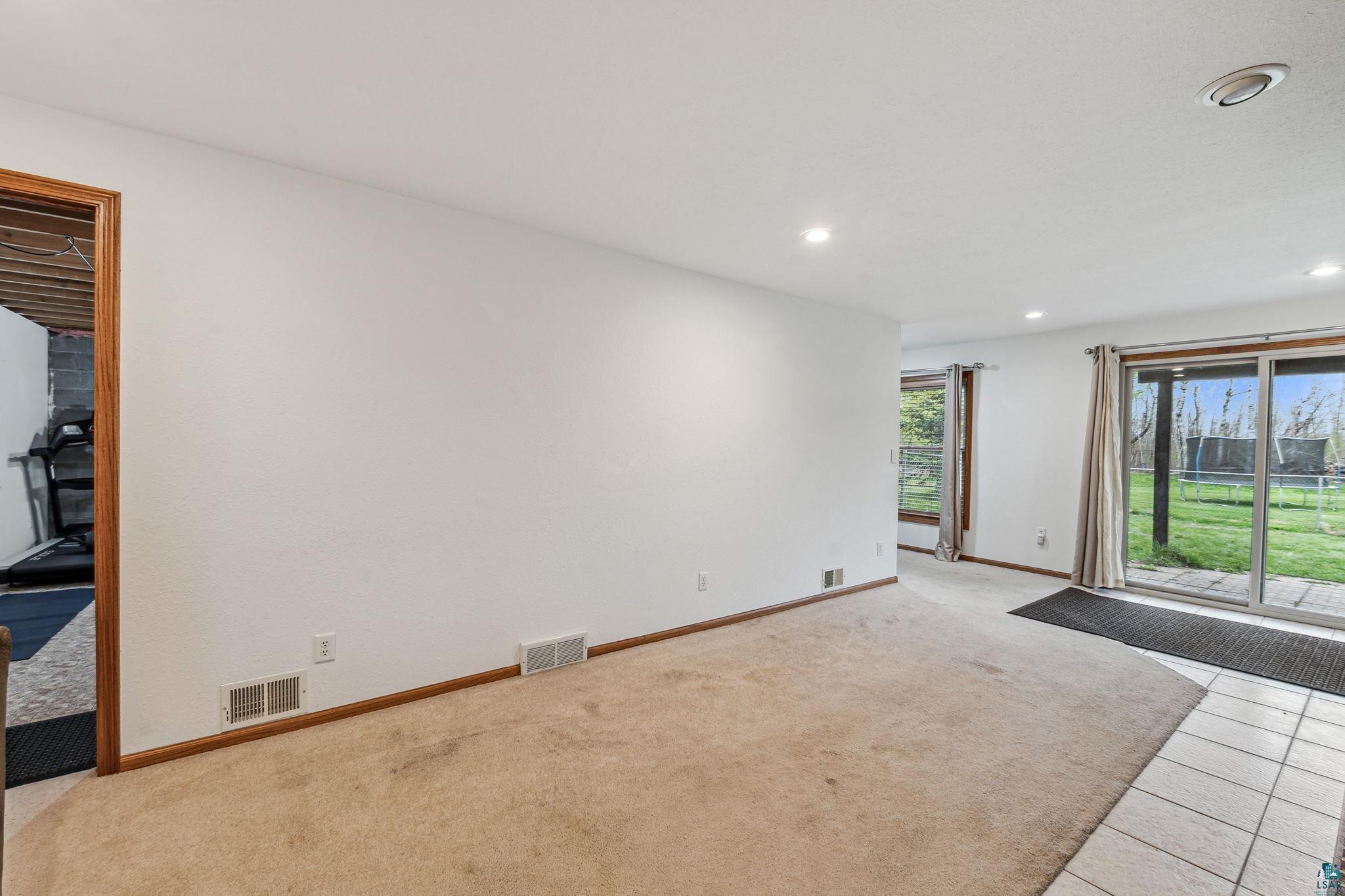 4372 Ugstad Road Hermantown, MN 55811 - Photo 11 of 21 View of tiled spare room