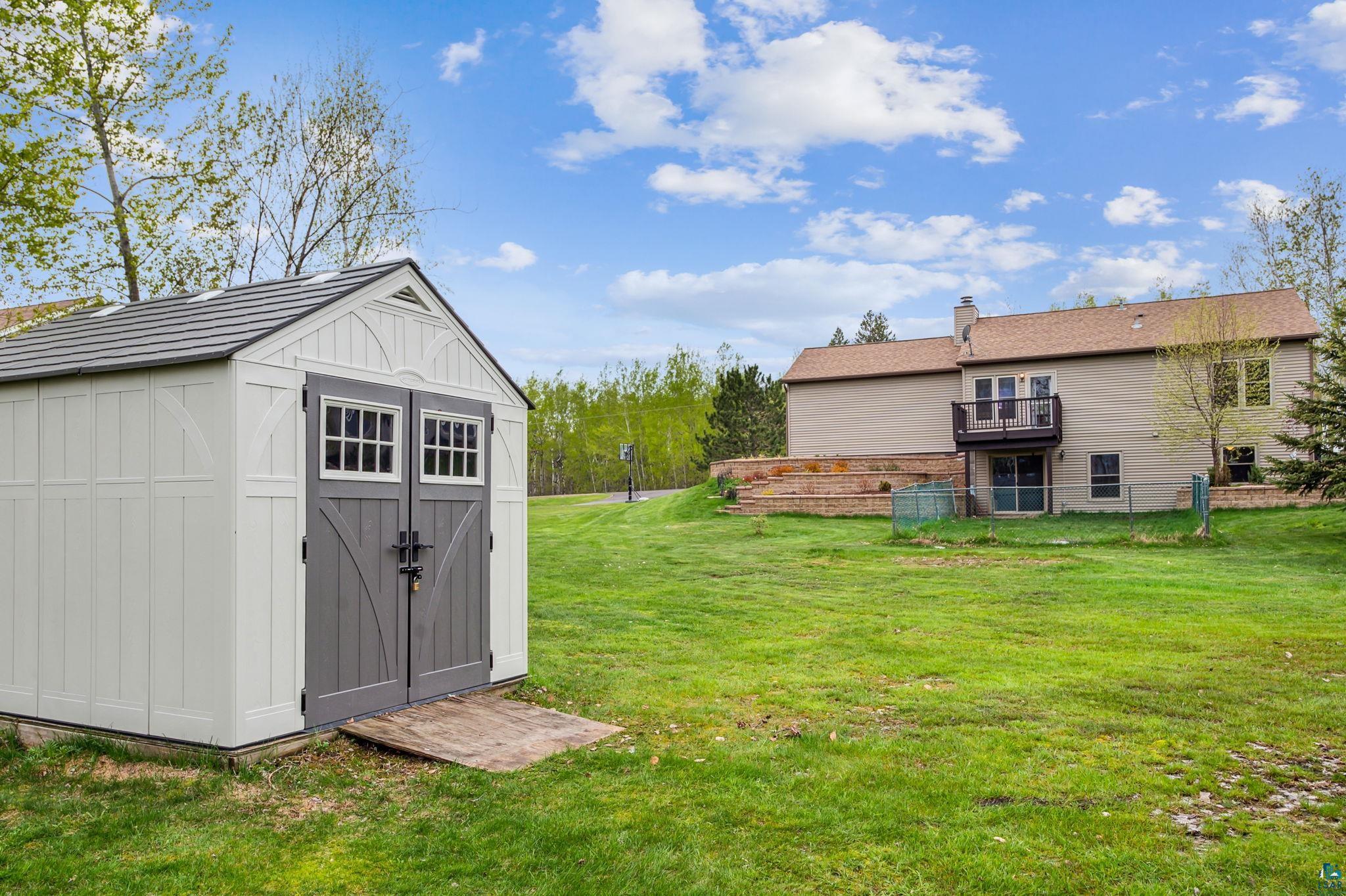 4372 Ugstad Road Hermantown, MN 55811 - Photo 17 of 21 View of shed / structure with a lawn
