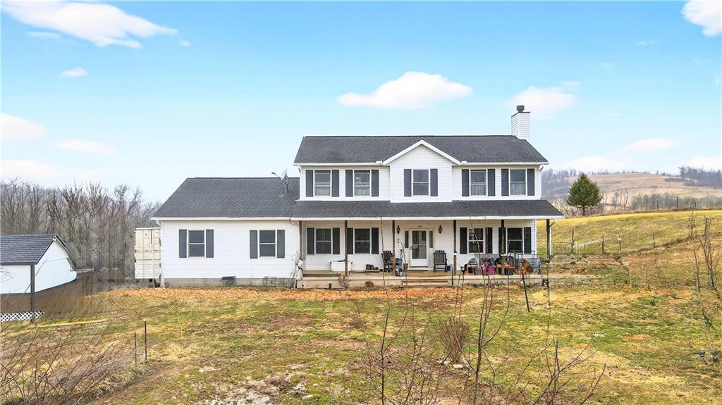 220 Main Road West Alexander, PA 15376 - Photo 1 of 44 a front view of a house with swimming pool