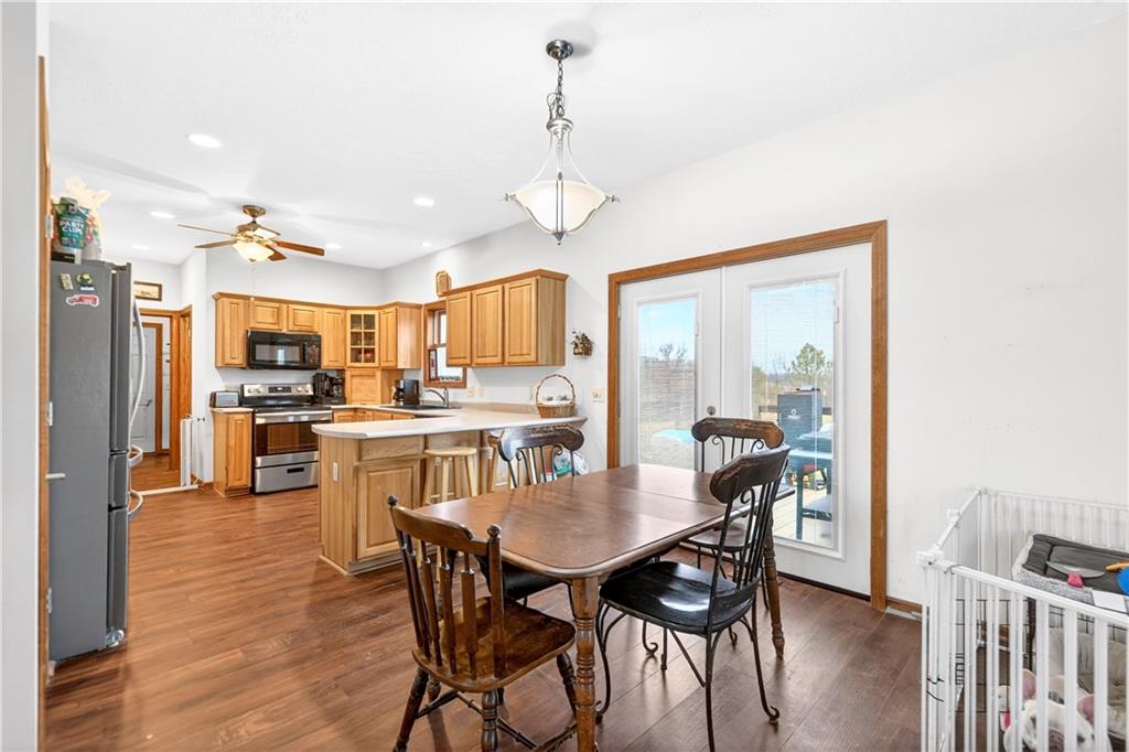 220 Main Road West Alexander, PA 15376 - Photo 9 of 44 a view of a dining room with furniture window and wooden floor