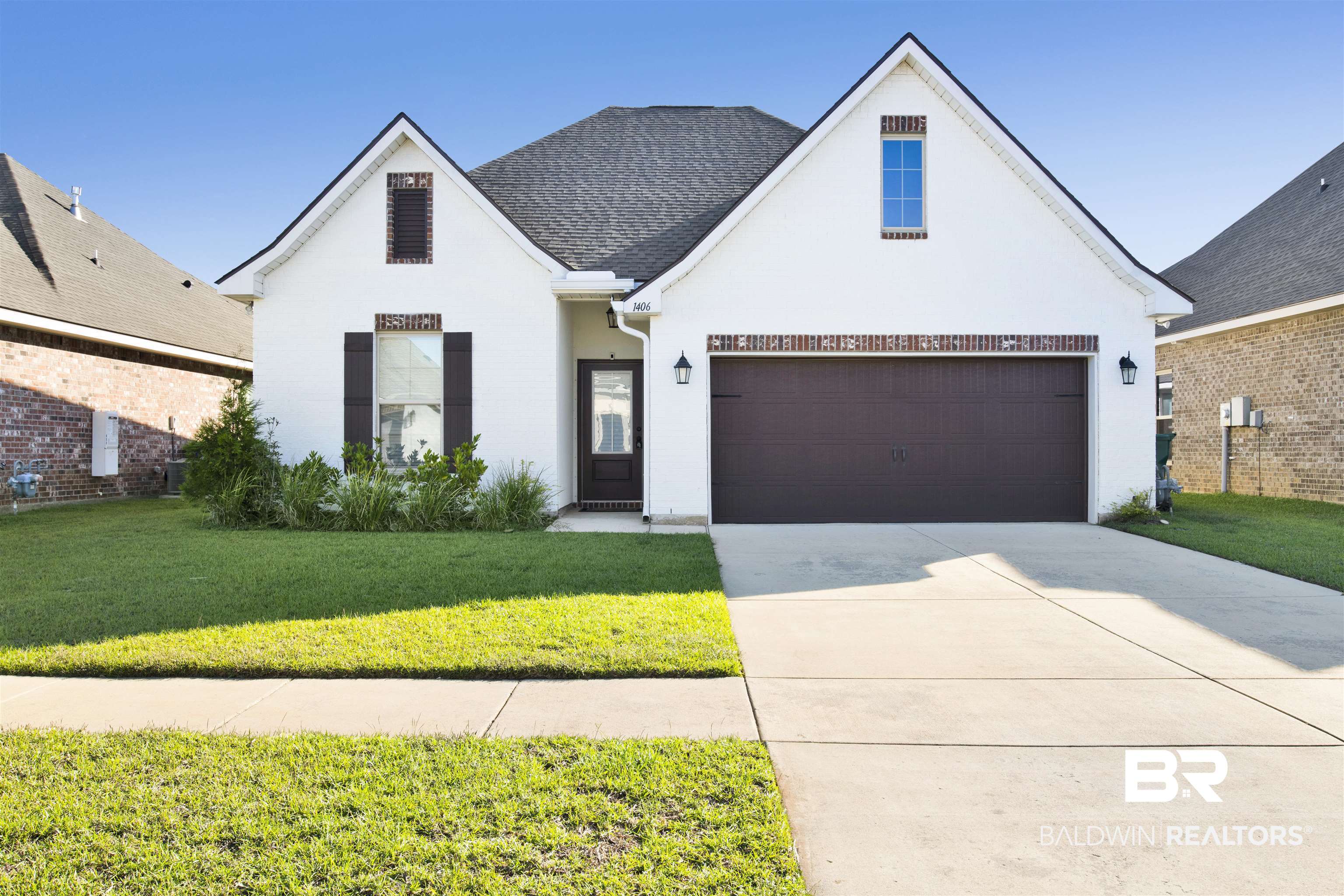 1406 Aldon Street Foley, AL 36535 - Photo 1 of 30 View of front of home with a front yard and a garage