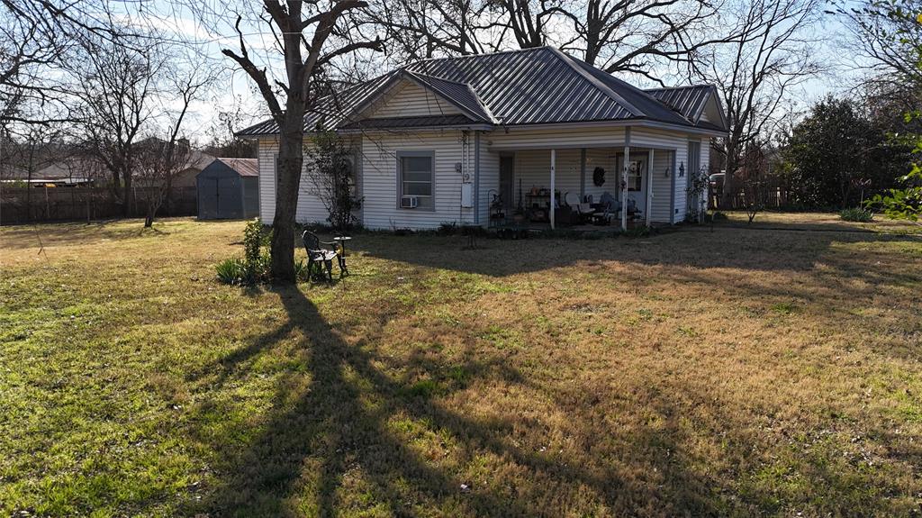 213 West Eldred Street, Unit 2 Burleson, TX 76028 - Photo 14 of 22 a view of house with yard