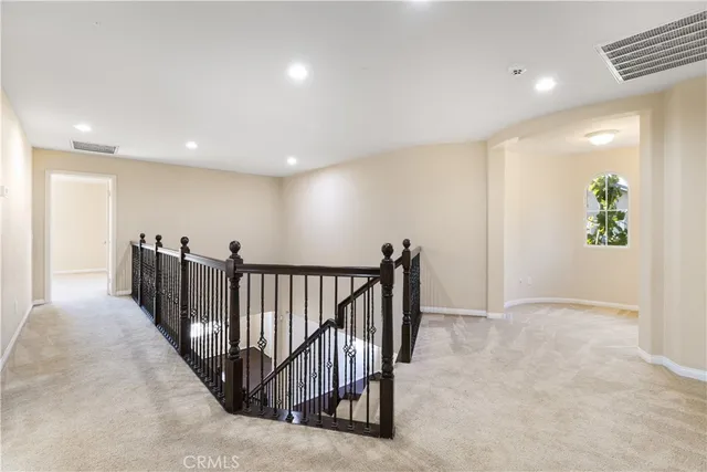 a view of hallway with livingroom