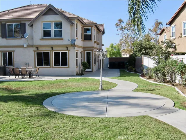 a view of a house with a swimming pool