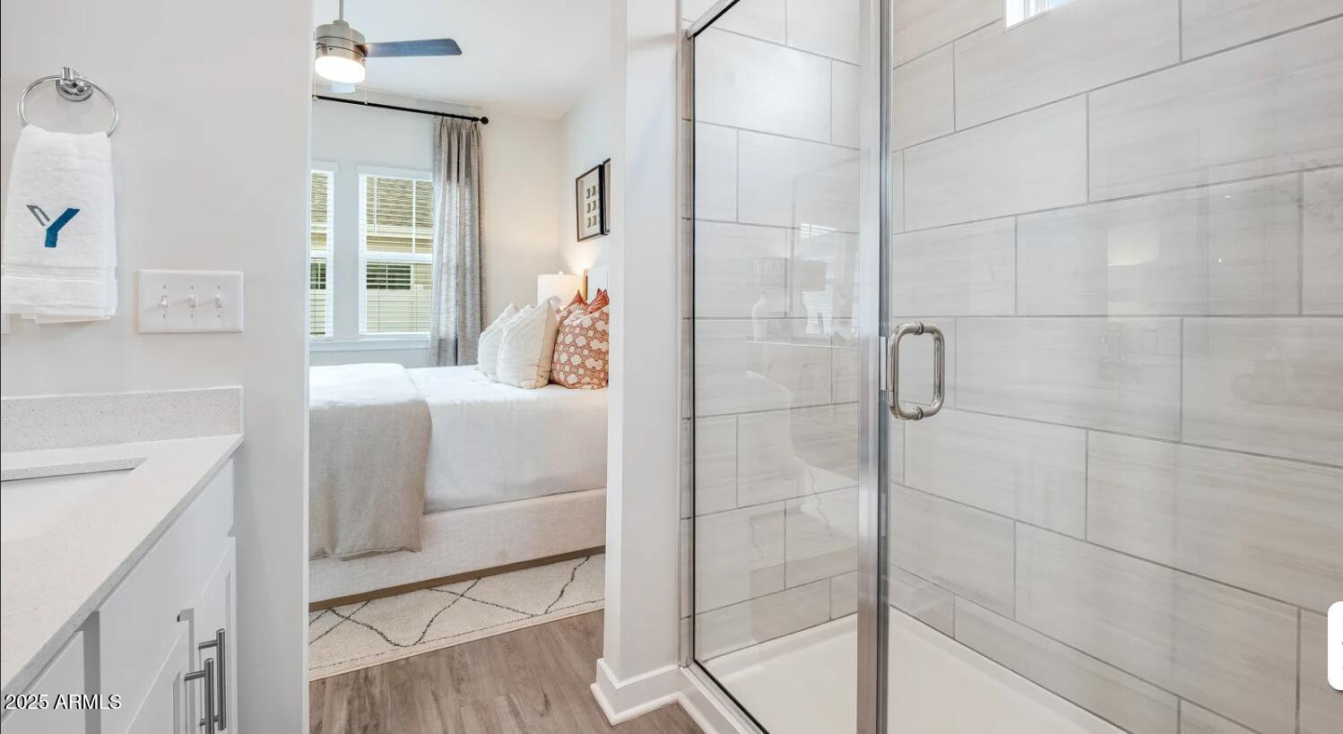 20807 West Indian School Road, Unit 2 Buckeye, AZ 85396 - Photo 8 of 9 a bathroom with a bathtub and shower