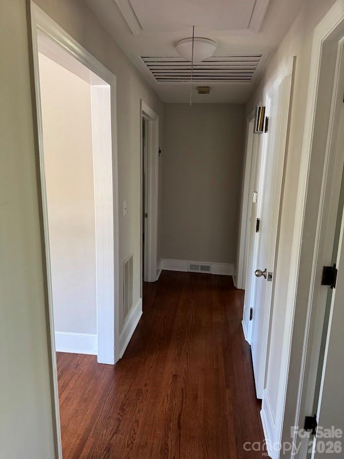 4424 Back Creek Church Road Charlotte, NC 28213 - Photo 11 of 15 a view of a hallway with wooden floor and staircase