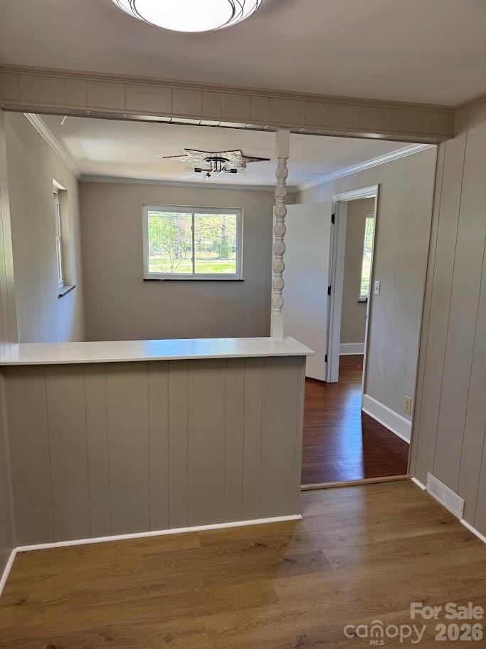 4424 Back Creek Church Road Charlotte, NC 28213 - Photo 4 of 15 a view of an empty room with wooden floor and a window