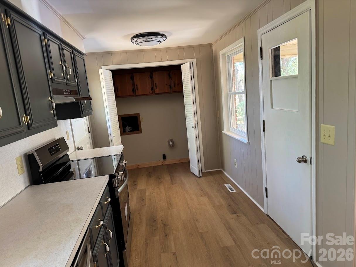 4424 Back Creek Church Road Charlotte, NC 28213 - Photo 8 of 15 a view of kitchen and wooden floor
