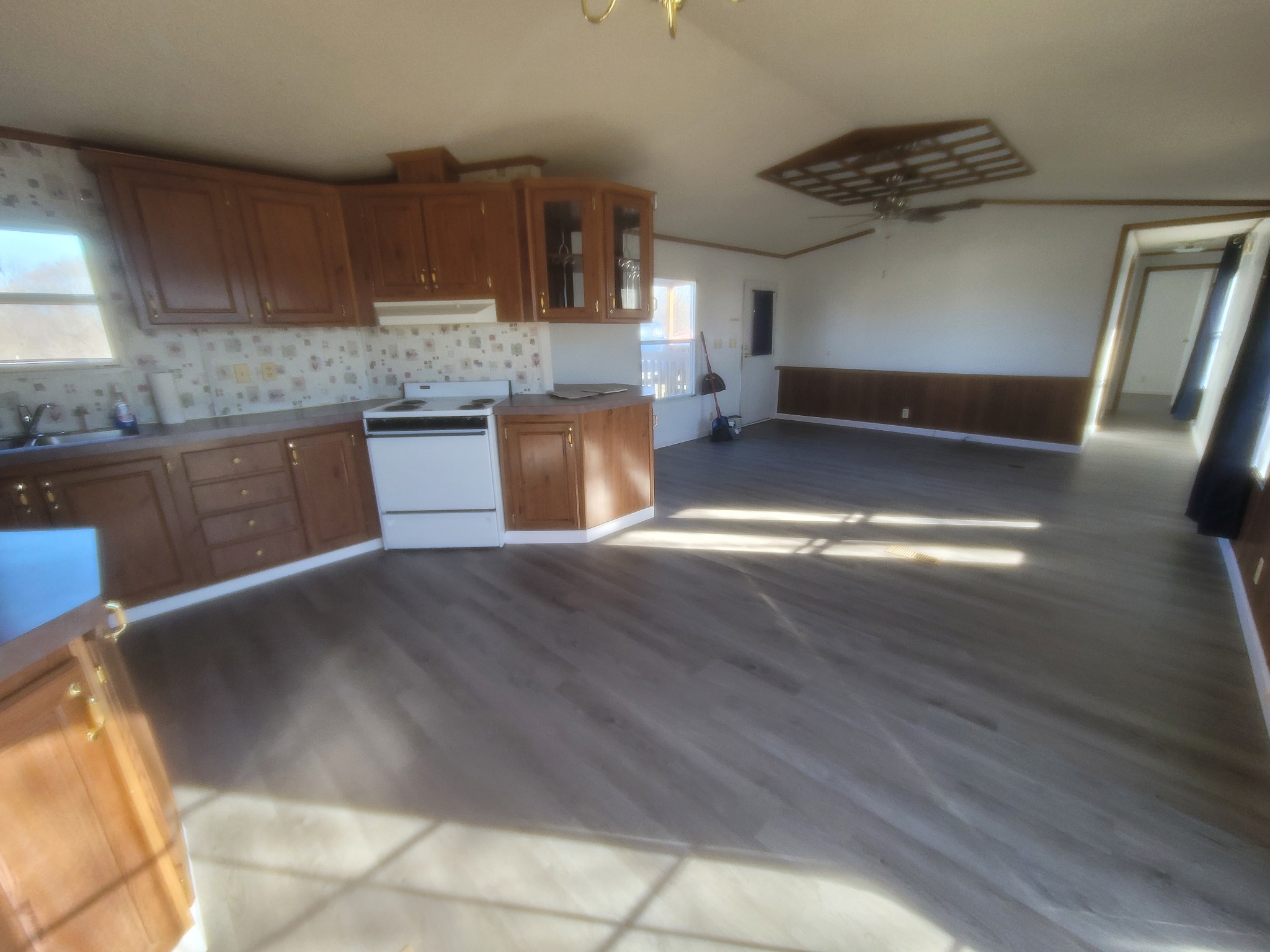 2918 Bryant Ridge Road Baxter, TN 38544 - Photo 2 of 15 a kitchen with stainless steel appliances granite countertop a stove a sink and a refrigerator
