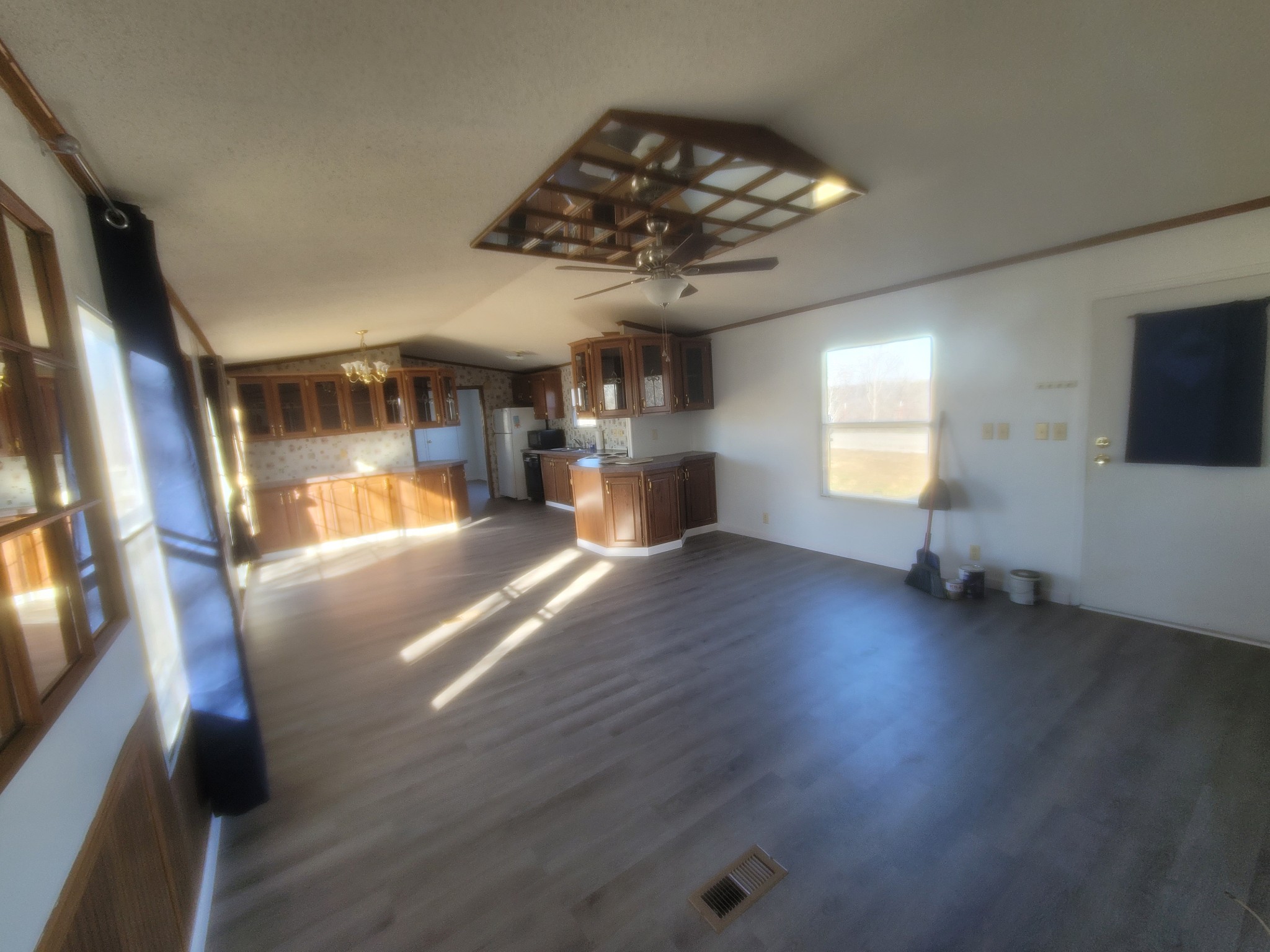 2918 Bryant Ridge Road Baxter, TN 38544 - Photo 4 of 15 an empty room with wooden floor and windows