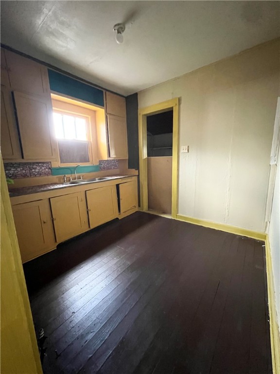 602 West Rice Street Falfurrias, TX 78355 - Photo 10 of 15 a view of an empty room with window and wooden floor