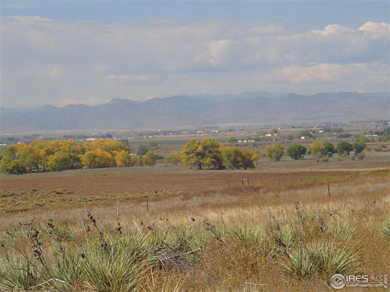 100 County Road Nunn, CO 80648 - Photo 1 of 12 a view of an outdoor space and a lake view