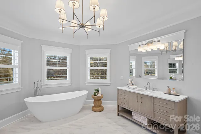 a living room with furniture and windows