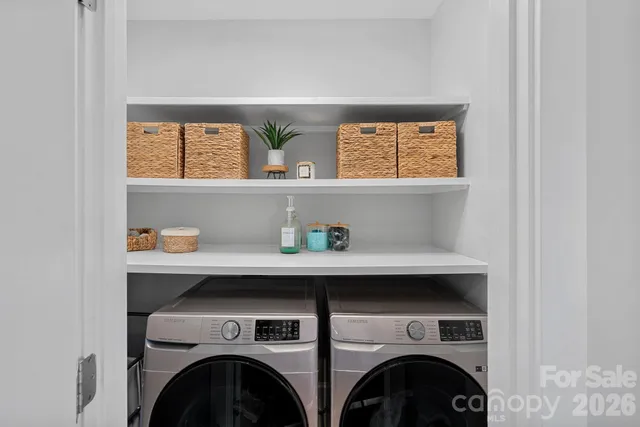 a utility room with dryer and washer