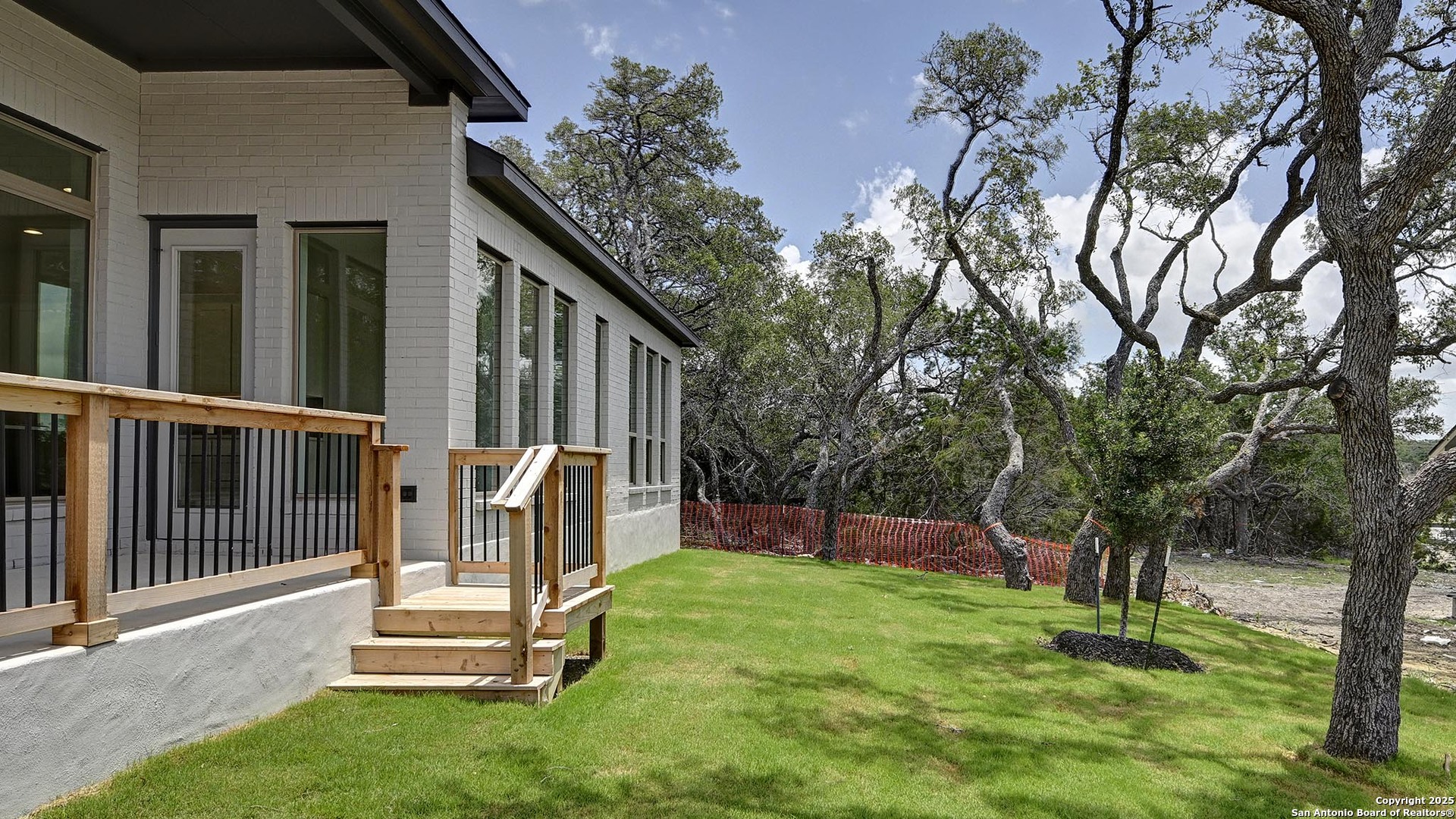 213 Fandango Boerne, TX 78006 - Photo 31 of 35 a view of backyard with deck and garden