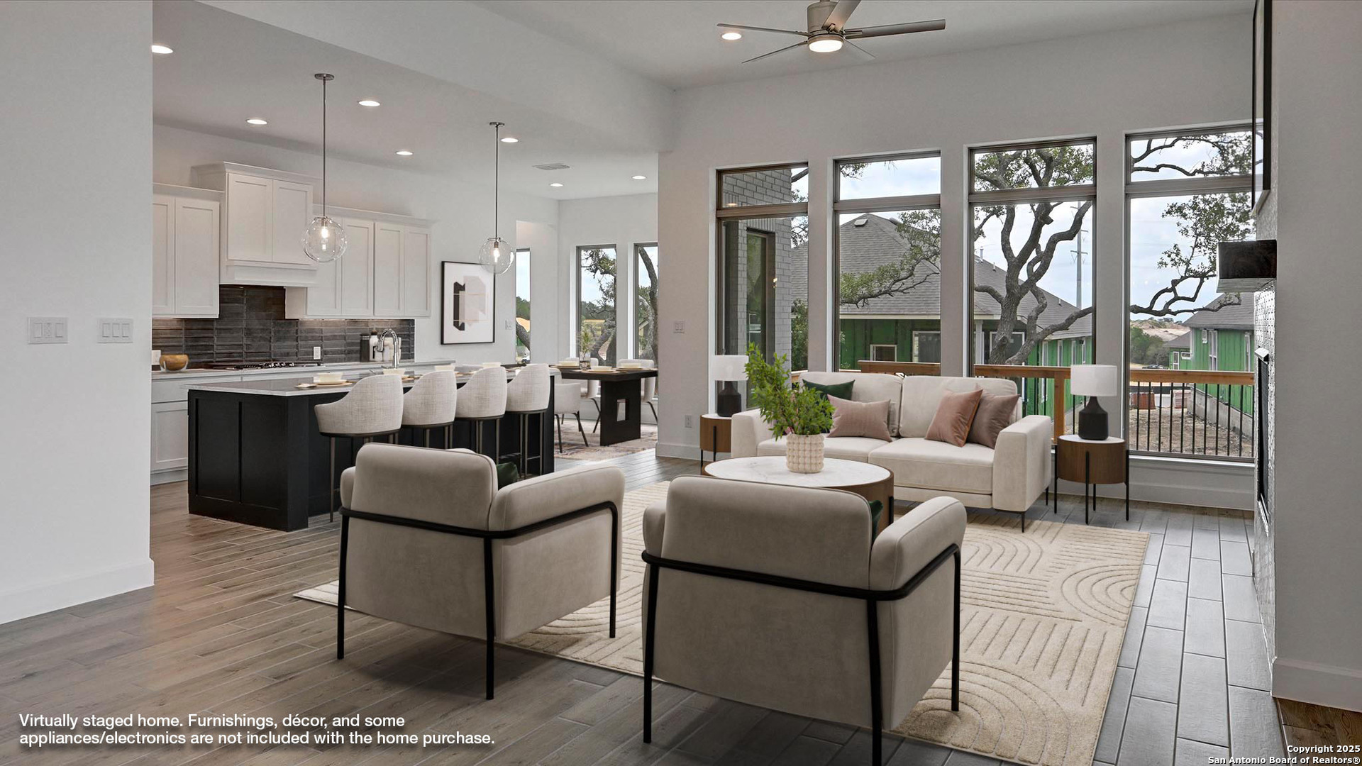 213 Fandango Boerne, TX 78006 - Photo 8 of 35 a living room with furniture a large window and a chandelier