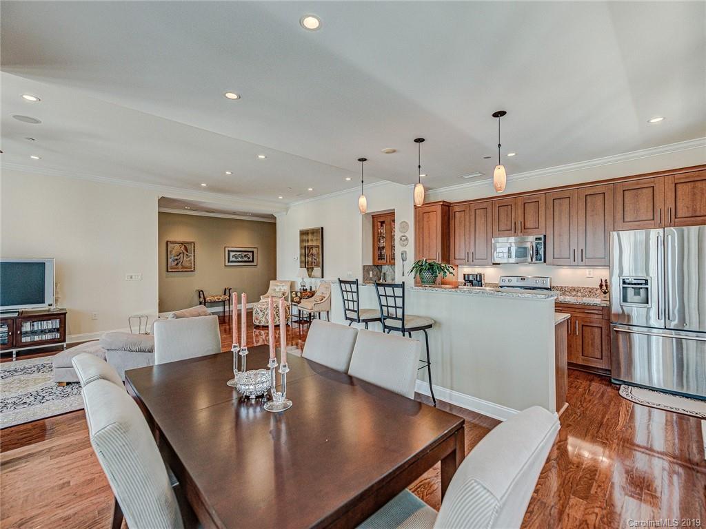 230 South Tryon Street, Unit 710 Charlotte, NC 28202 - Photo 17 of 48 a view of kitchen with dining area