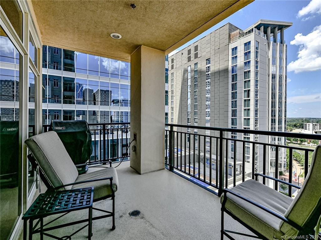 230 South Tryon Street, Unit 710 Charlotte, NC 28202 - Photo 34 of 48 a balcony view with a seating space