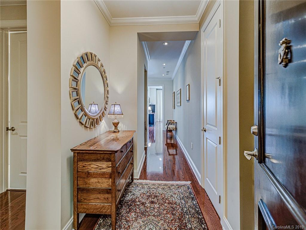 230 South Tryon Street, Unit 710 Charlotte, NC 28202 - Photo 5 of 48 a view of an entryway with wooden floor