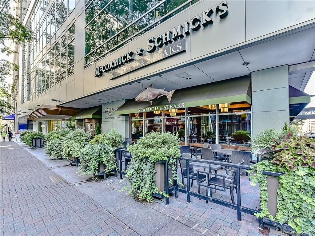230 South Tryon Street, Unit 710 Charlotte, NC 28202 - Photo 45 of 48 a view of a patio with plants
