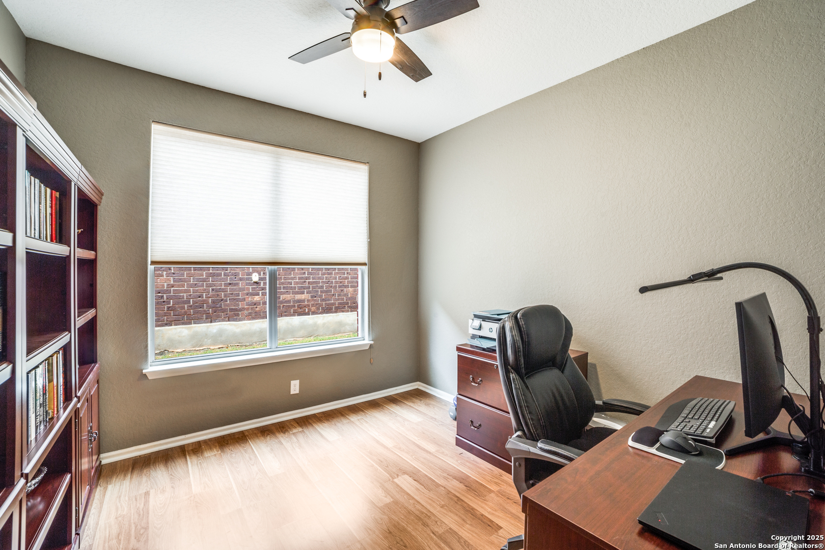 12434 Modena Bay San Antonio, TX 78253 - Photo 17 of 25 a view of workspace with furniture and a window