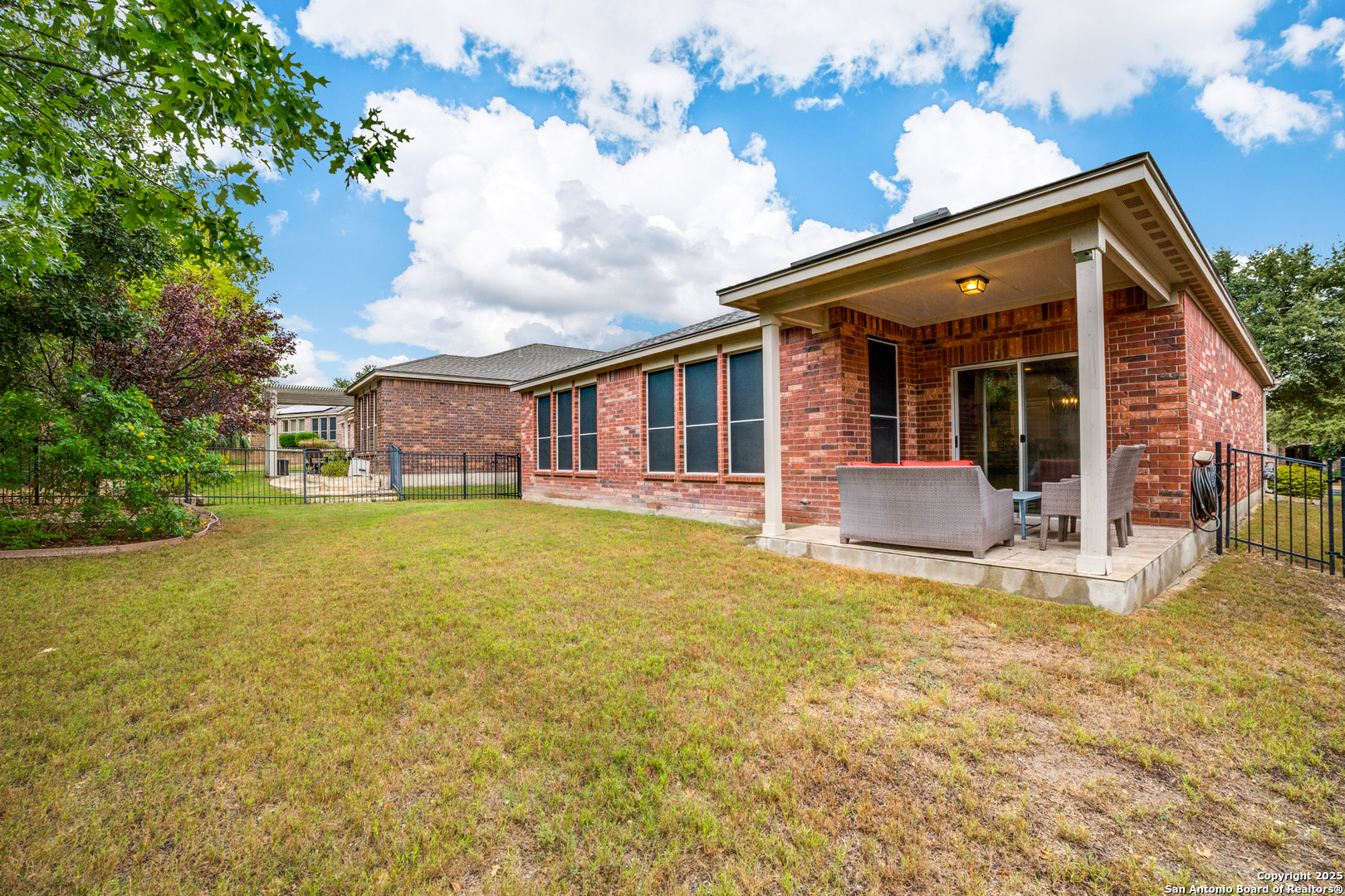 12434 Modena Bay San Antonio, TX 78253 - Photo 20 of 25 a view of a house with pool and sitting area