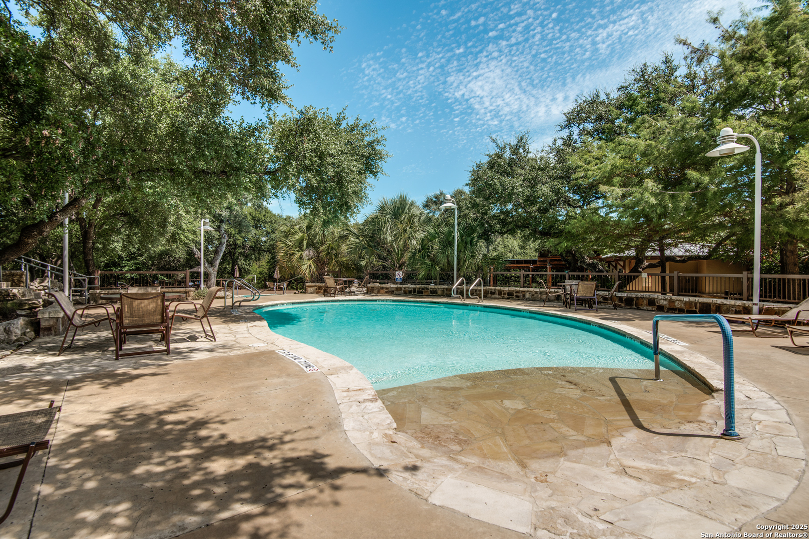 12434 Modena Bay San Antonio, TX 78253 - Photo 24 of 25 a view of a swimming pool with a patio