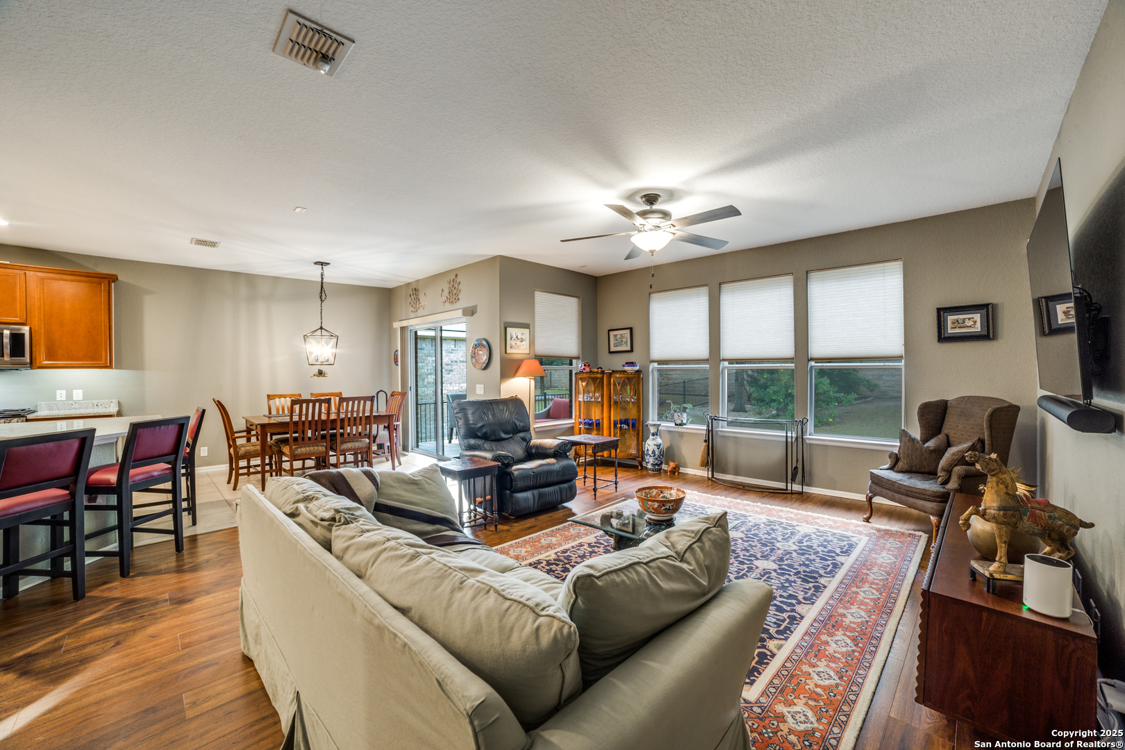 12434 Modena Bay San Antonio, TX 78253 - Photo 7 of 25 a living room with furniture fireplace and a large window