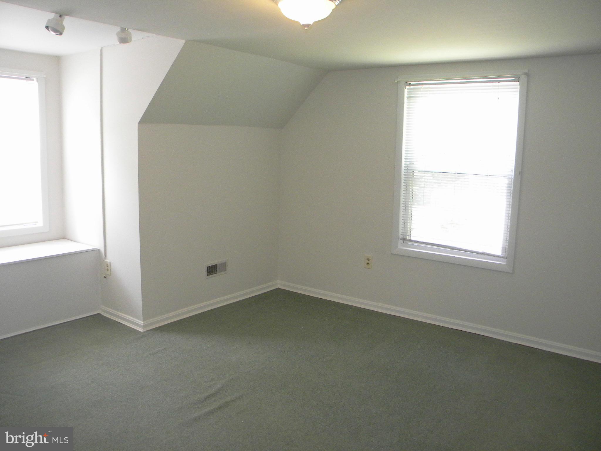 818 Ridge Court Lusby, MD 20657 - Photo 17 of 18 an empty room with a window