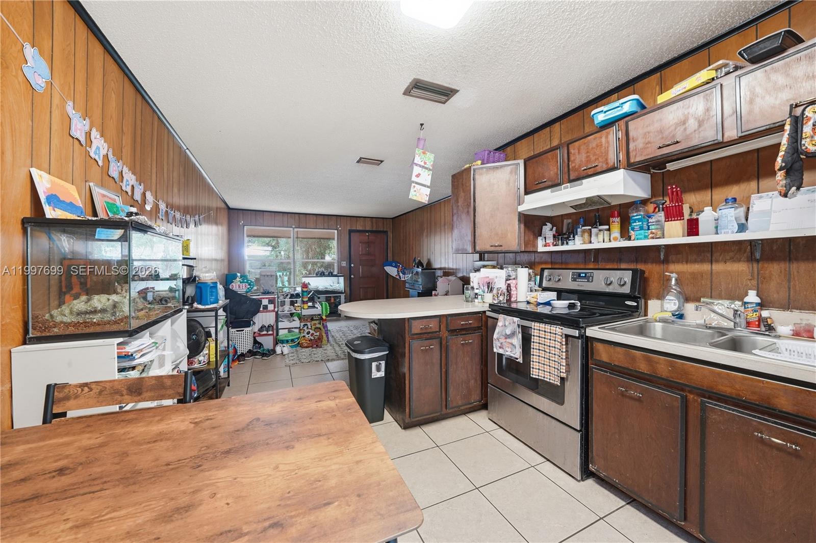 1910 South 34th Street Fort Pierce, FL 34947 - Photo 7 of 24 a kitchen with lots of counter top space