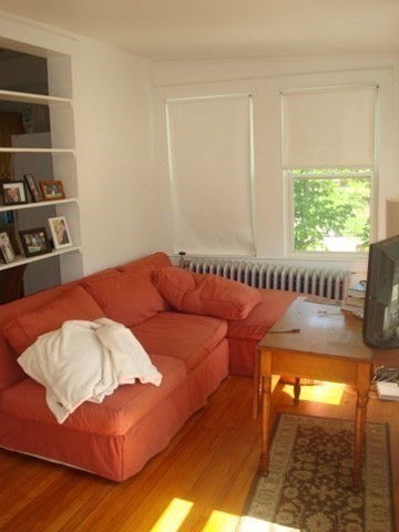 5-7 Abbott Street Wellesley, MA 02482 - Photo 15 of 28 a bedroom with a bed and a window