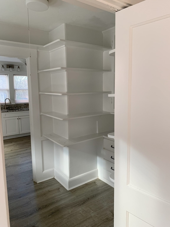5-7 Abbott Street Wellesley, MA 02482 - Photo 25 of 28 a view of empty room with wooden floor and a window