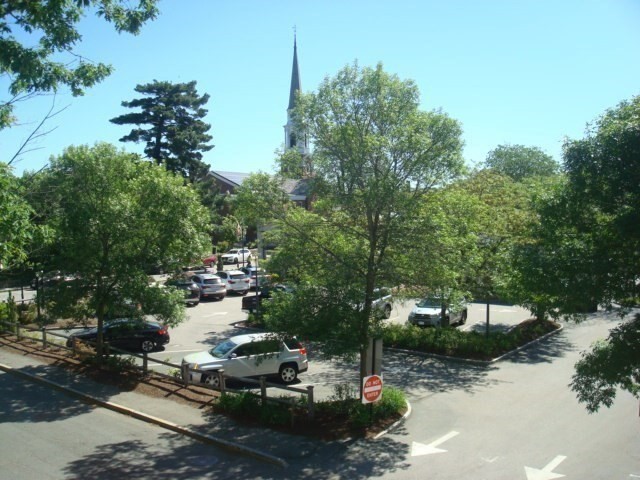 5-7 Abbott Street Wellesley, MA 02482 - Photo 5 of 28 a view of a lake with houses