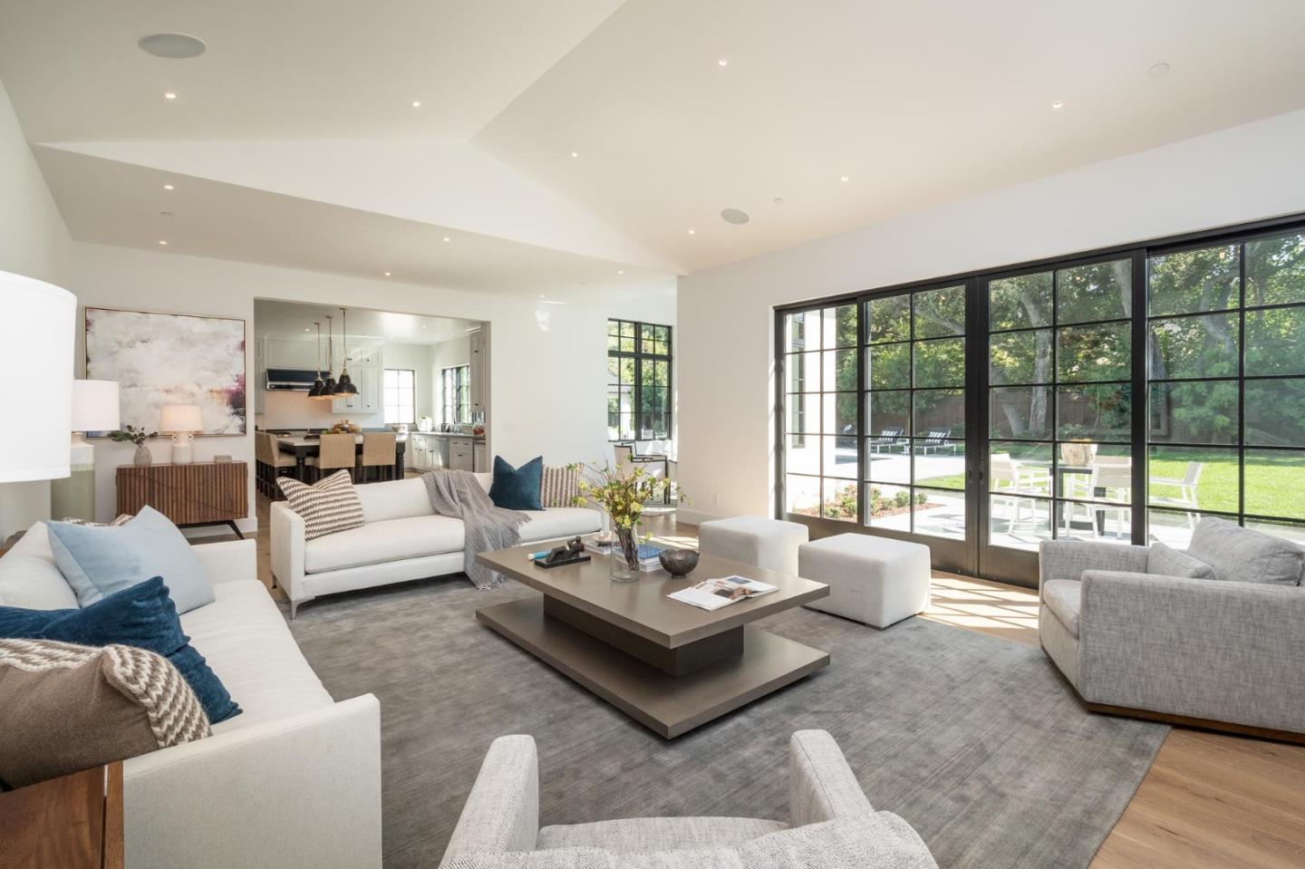 52 Middlefield Road Atherton, CA 94027 - Photo 12 of 45 a living room with furniture and a large window