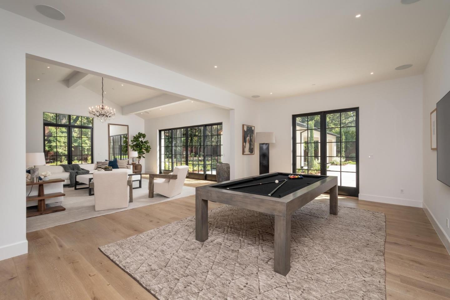 52 Middlefield Road Atherton, CA 94027 - Photo 15 of 45 a living room with furniture and a large window