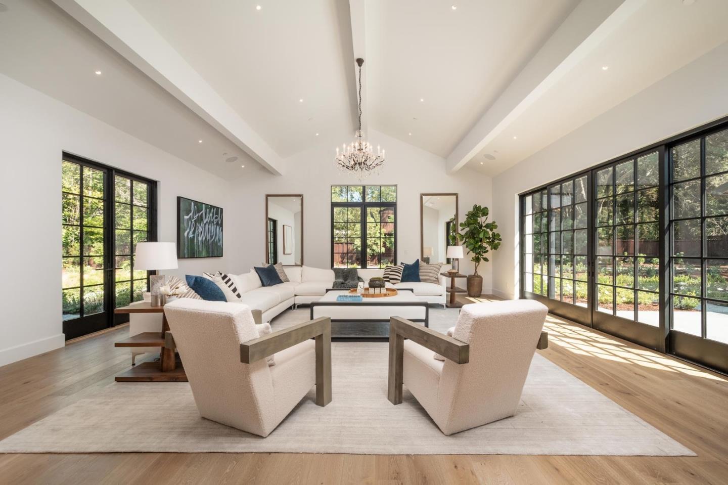52 Middlefield Road Atherton, CA 94027 - Photo 16 of 45 a living room with furniture large windows and wooden floor