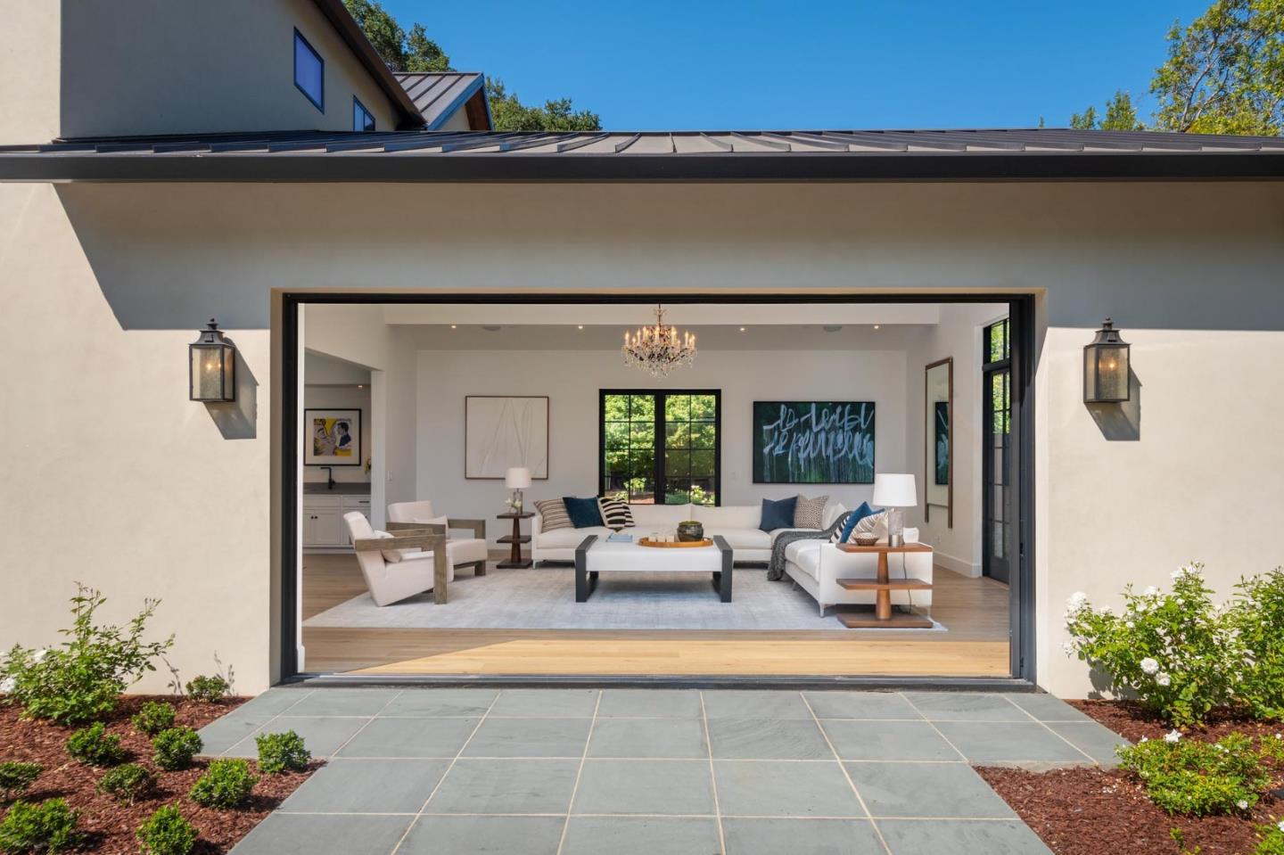 52 Middlefield Road Atherton, CA 94027 - Photo 18 of 45 a living room with furniture and flowers