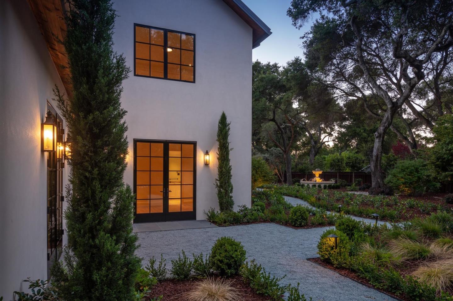 52 Middlefield Road Atherton, CA 94027 - Photo 5 of 45 a front view of a house with a yard