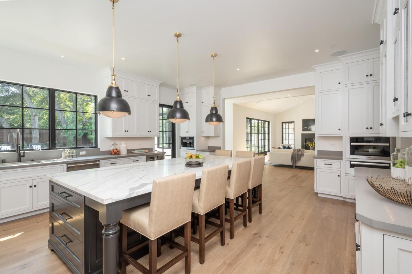 52 Middlefield Road Atherton, CA 94027 - Photo 10 of 45 a large kitchen with a table and chairs