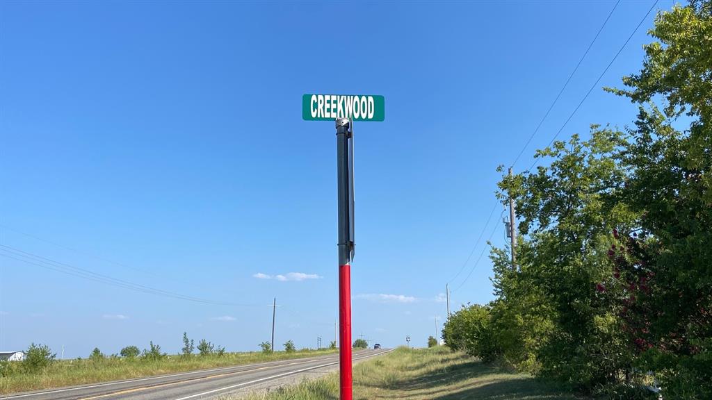 Enter Creekwood Street for one side of acreage.