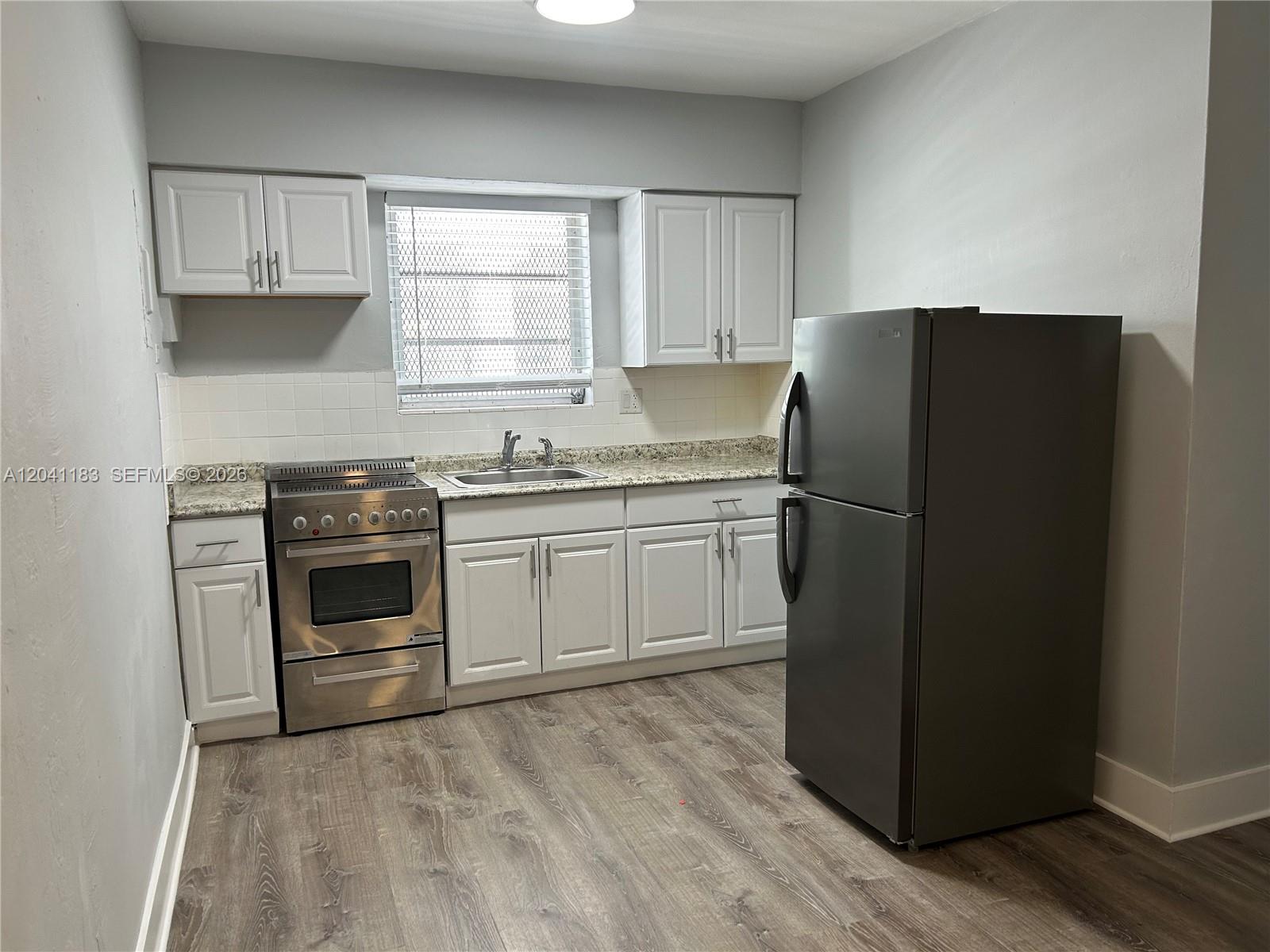 1346 Alton Road, Unit A1 Miami Beach, FL 33139 - Photo 3 of 11