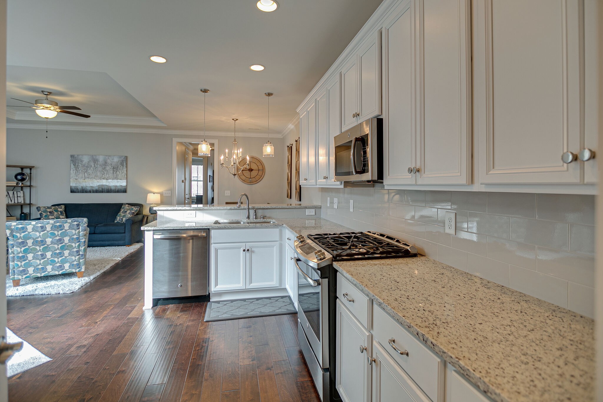 413 Courfield Drive Franklin, TN 37064 - Photo 11 of 27 a kitchen with granite countertop a sink cabinets and stainless steel appliances