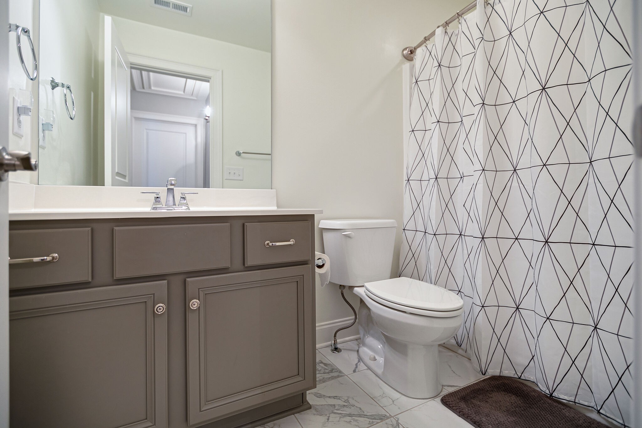 413 Courfield Drive Franklin, TN 37064 - Photo 23 of 27 a bathroom with a sink toilet and vanity