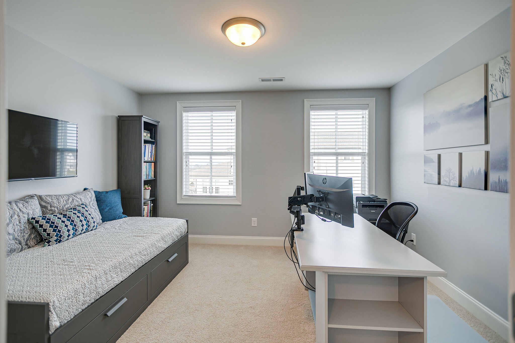 413 Courfield Drive Franklin, TN 37064 - Photo 24 of 27 a bedroom with a bed and a couch