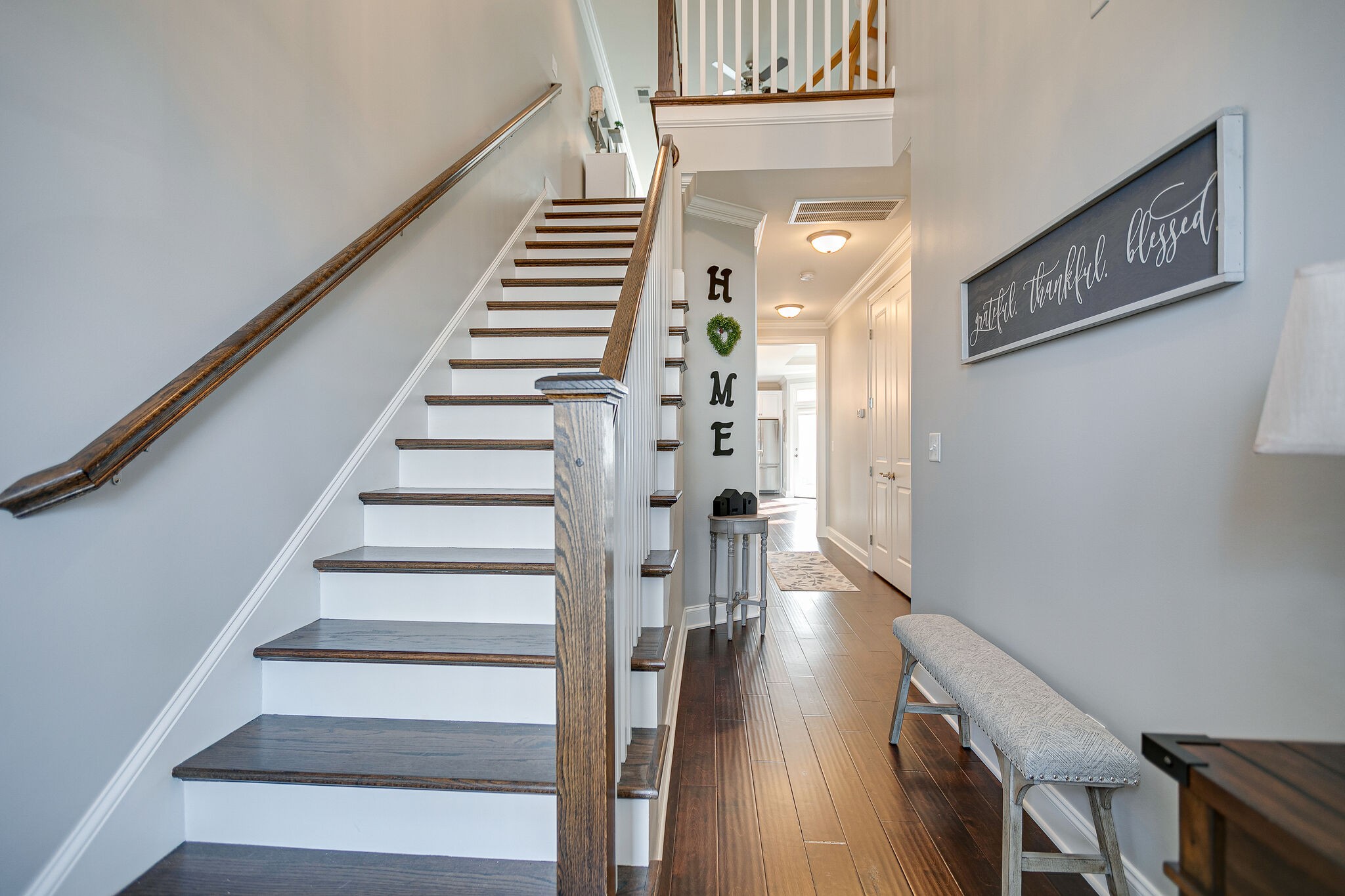 413 Courfield Drive Franklin, TN 37064 - Photo 5 of 27 a view of entryway and hall with wooden floor